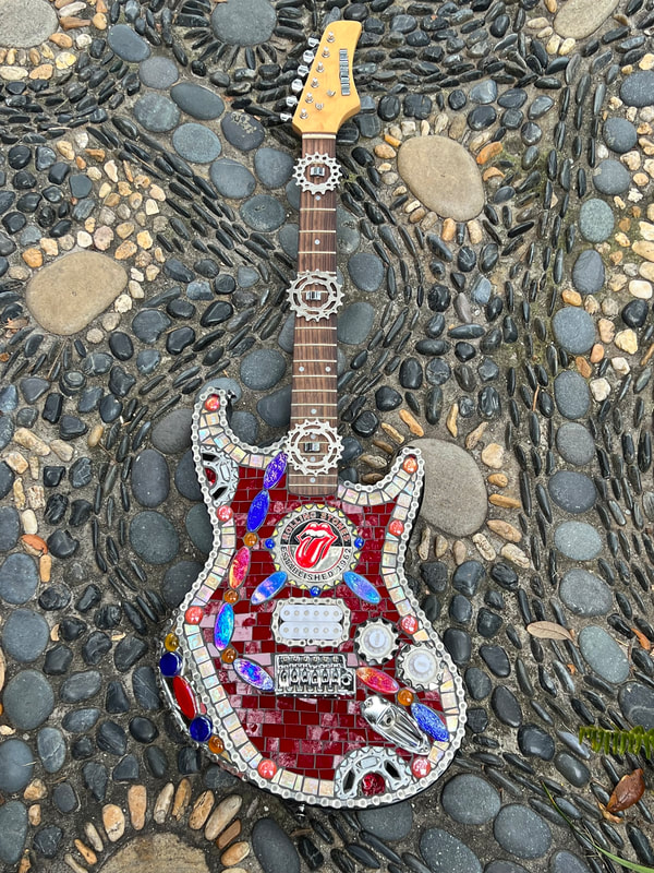 You Can Get Satisfaction with this - Rolling Stones Electric guitar,
39"x13"x1.5" 